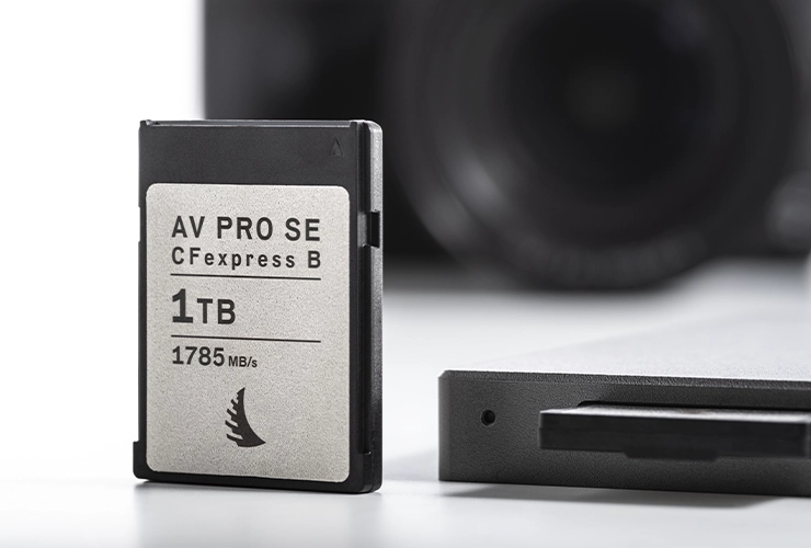 CFexpress B SE 1 TB memory card on a front view with a blurred camera in the background