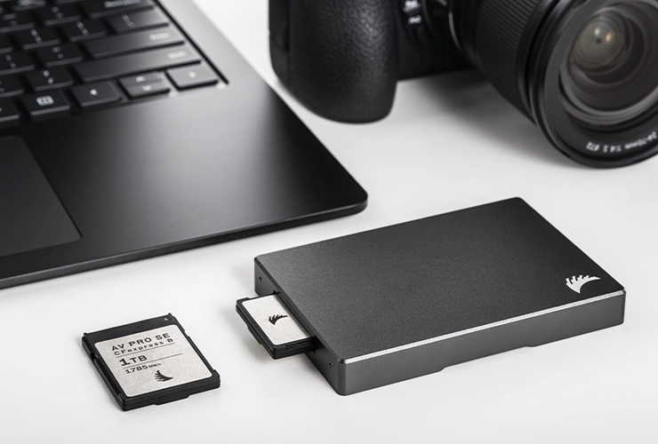 CFexpress B Card Reader beside a computer with a CFexpress B Card inside an a CFexpress B Card on the outside